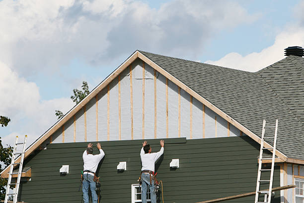 Professional Vinyl Siding technician working in Oldenburg, IN